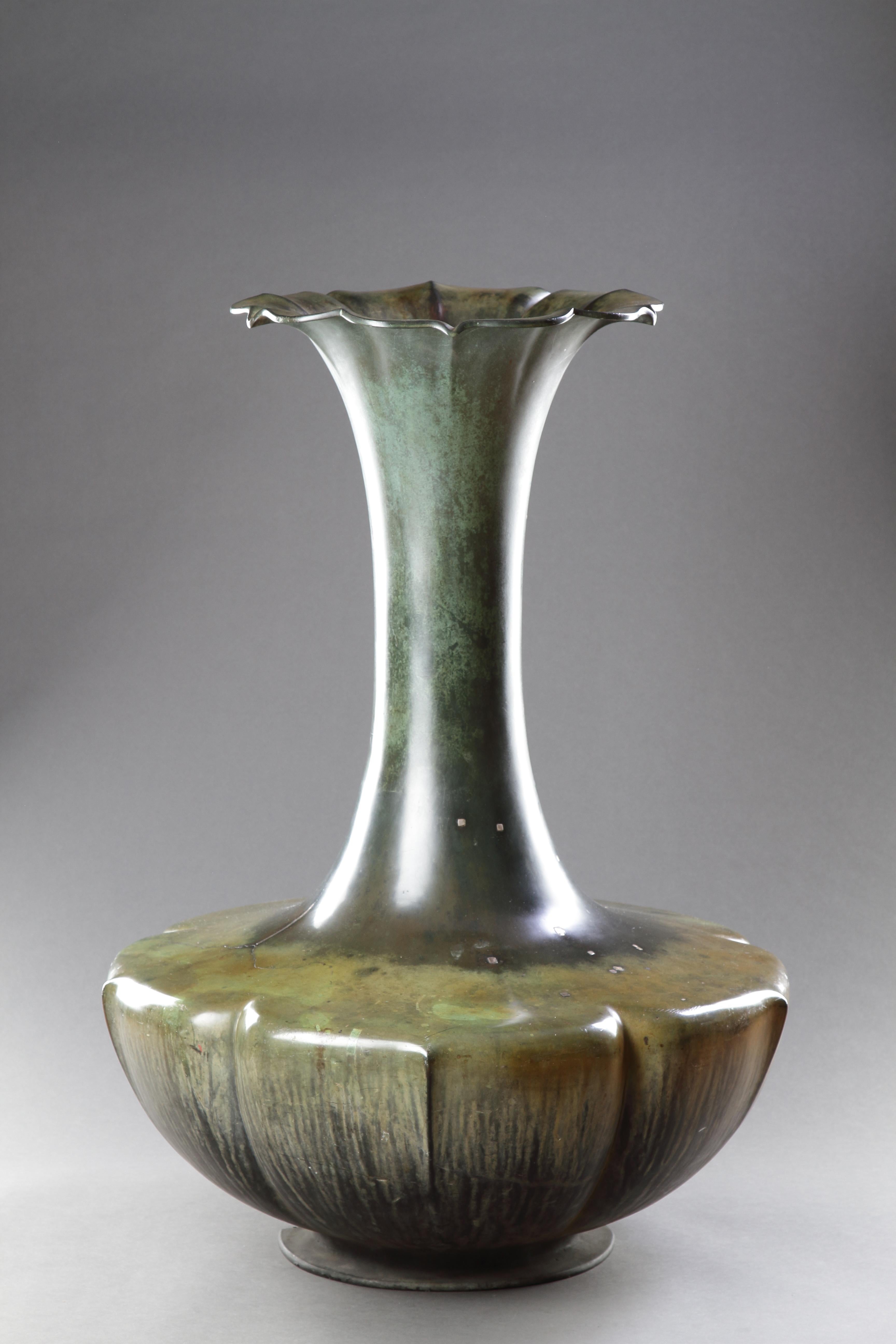 A Superb and Very Large Japanese Vase 
Superb colour and patina 
Bronze, silver (underside of base missing) old silver repairs to 'fissures' and firing faults 
Japan 
19th Century 

SIZE: 91.5cm high, 66cm dia. (max) - 36 ins high, 26 ins dia. (max)