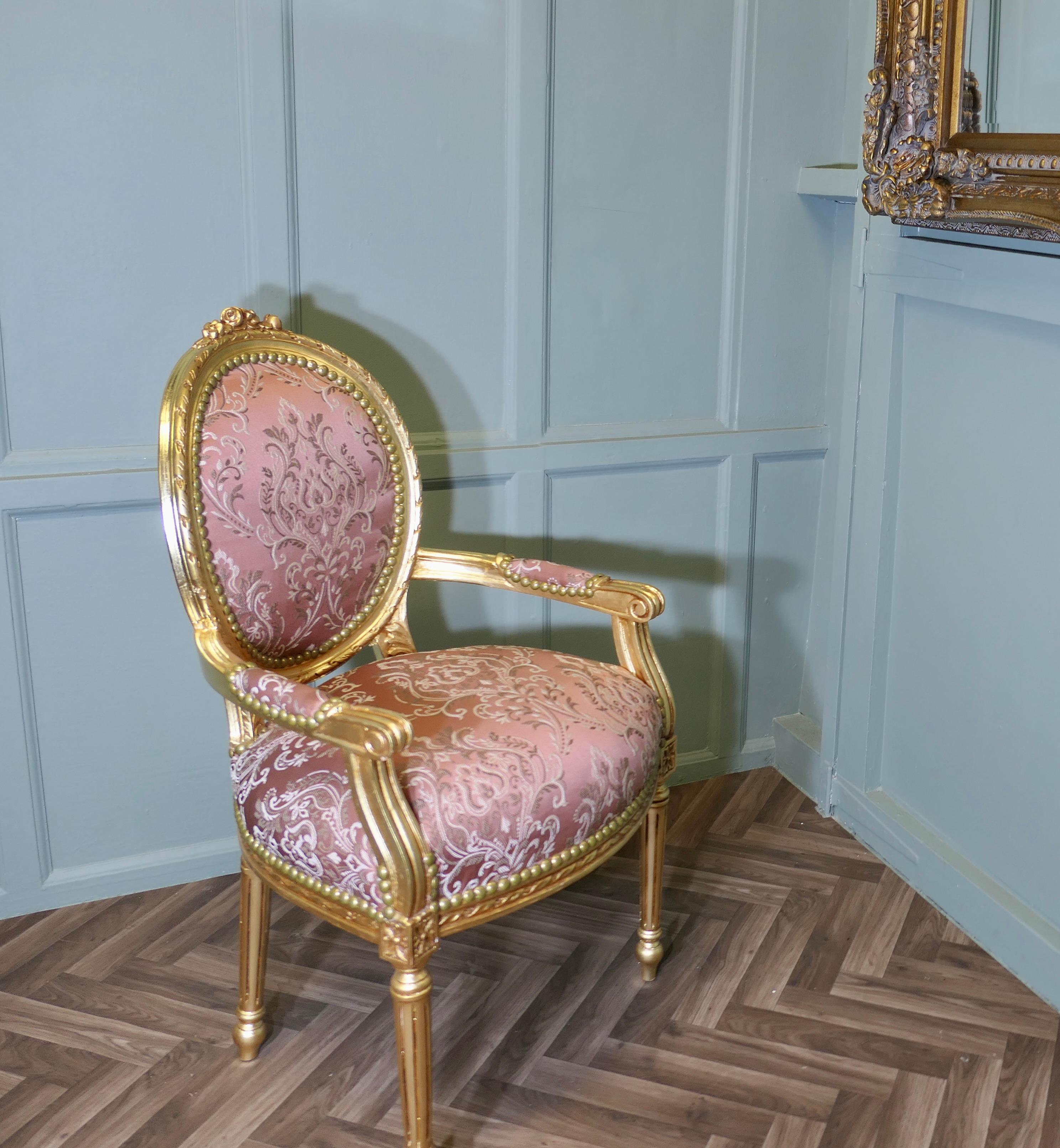 

A Superb French 19th Century Gilt Salon Chair

This Elegant Chair has been re finished and upholstered in Pink Bronze Silk Damask
A beautiful chair newly brought from France it is in very good restored condition and would work almost anywhere 
The