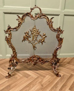 A Superb French Brass Rococo Spark Guard, Fire Screen