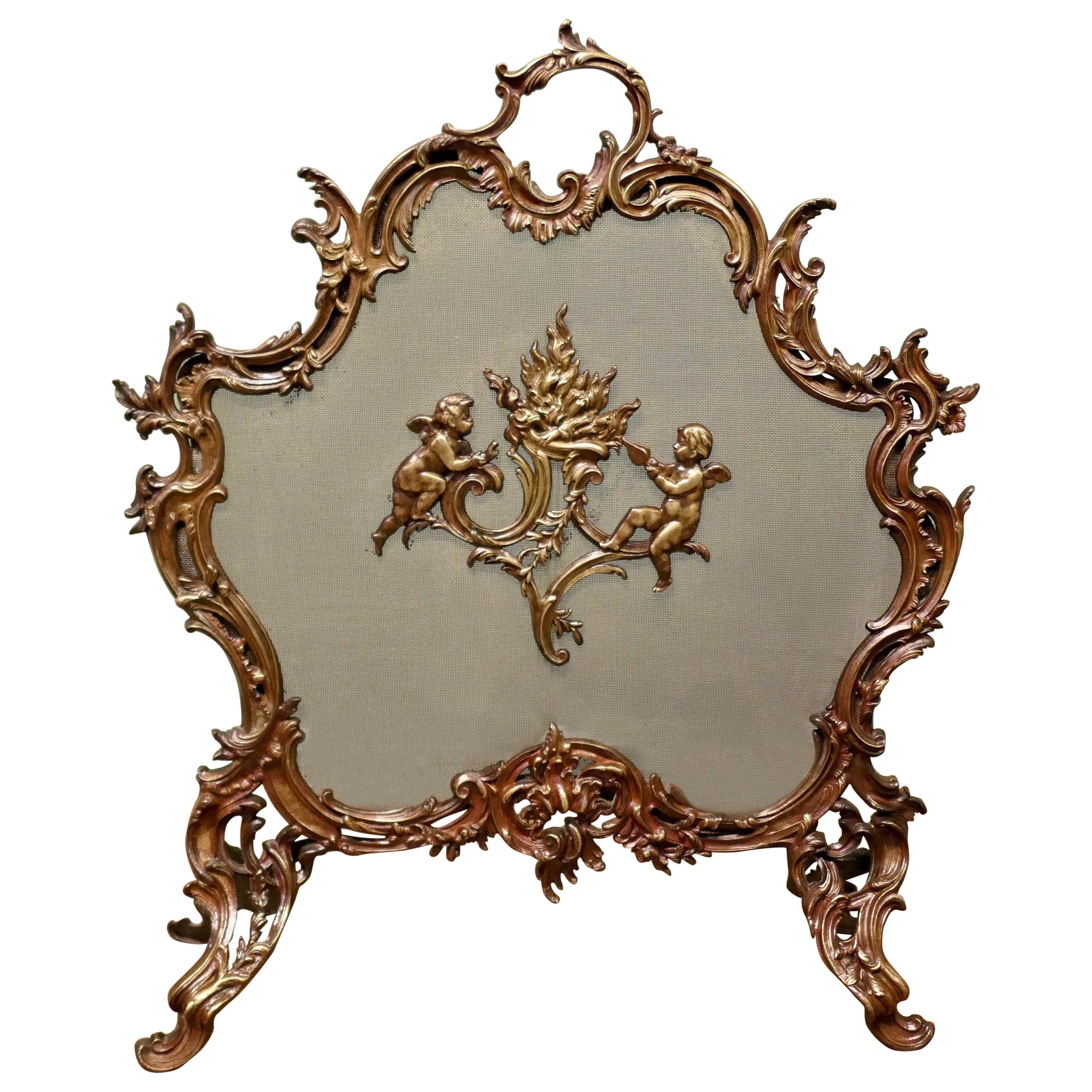 Un superbo parascintille rococò in ottone francese, parafuoco in vendita