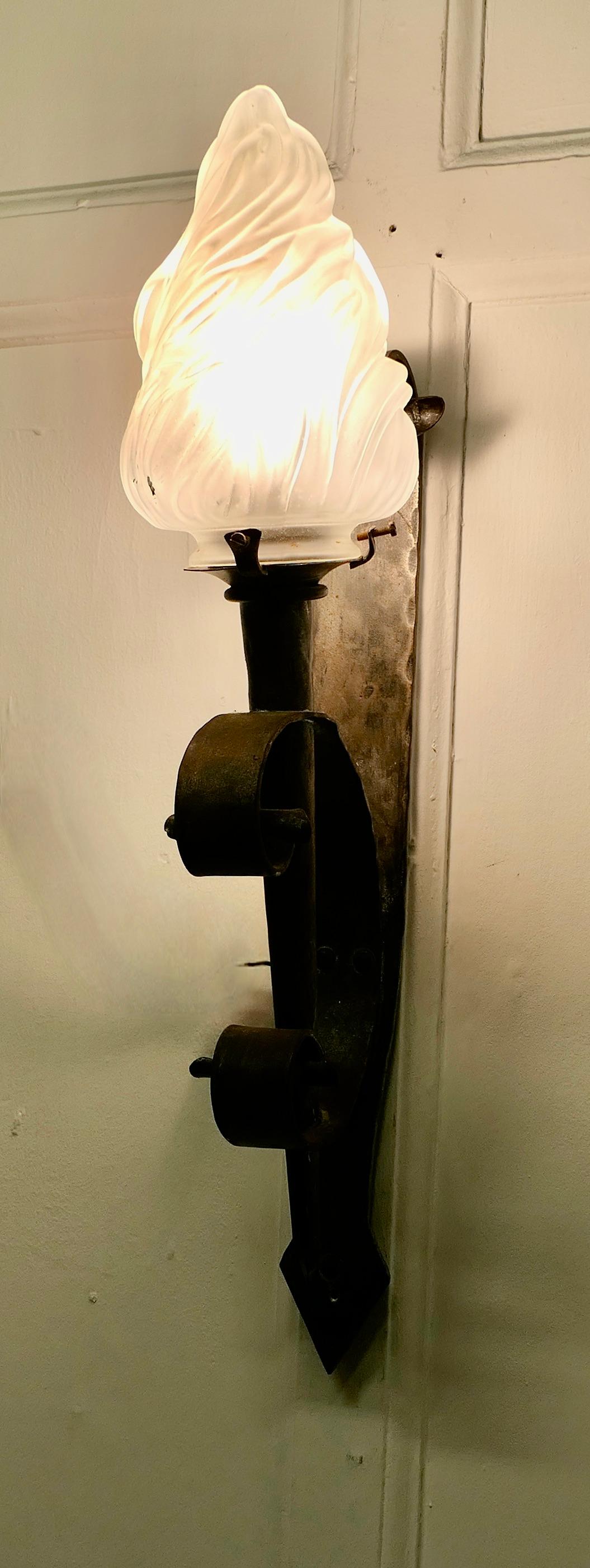 A Superb French Gothic Iron Wall Light

A very handsome Large Heavy French wall light, the light is set at a slight incline and would enhance the entrance of any Gothic Doorway or light a Castle Porch, it is in good condition and working

The Light