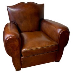 A Superb French Leather Club Chair, Havana Moustache Model with Cuban Cigar Arms