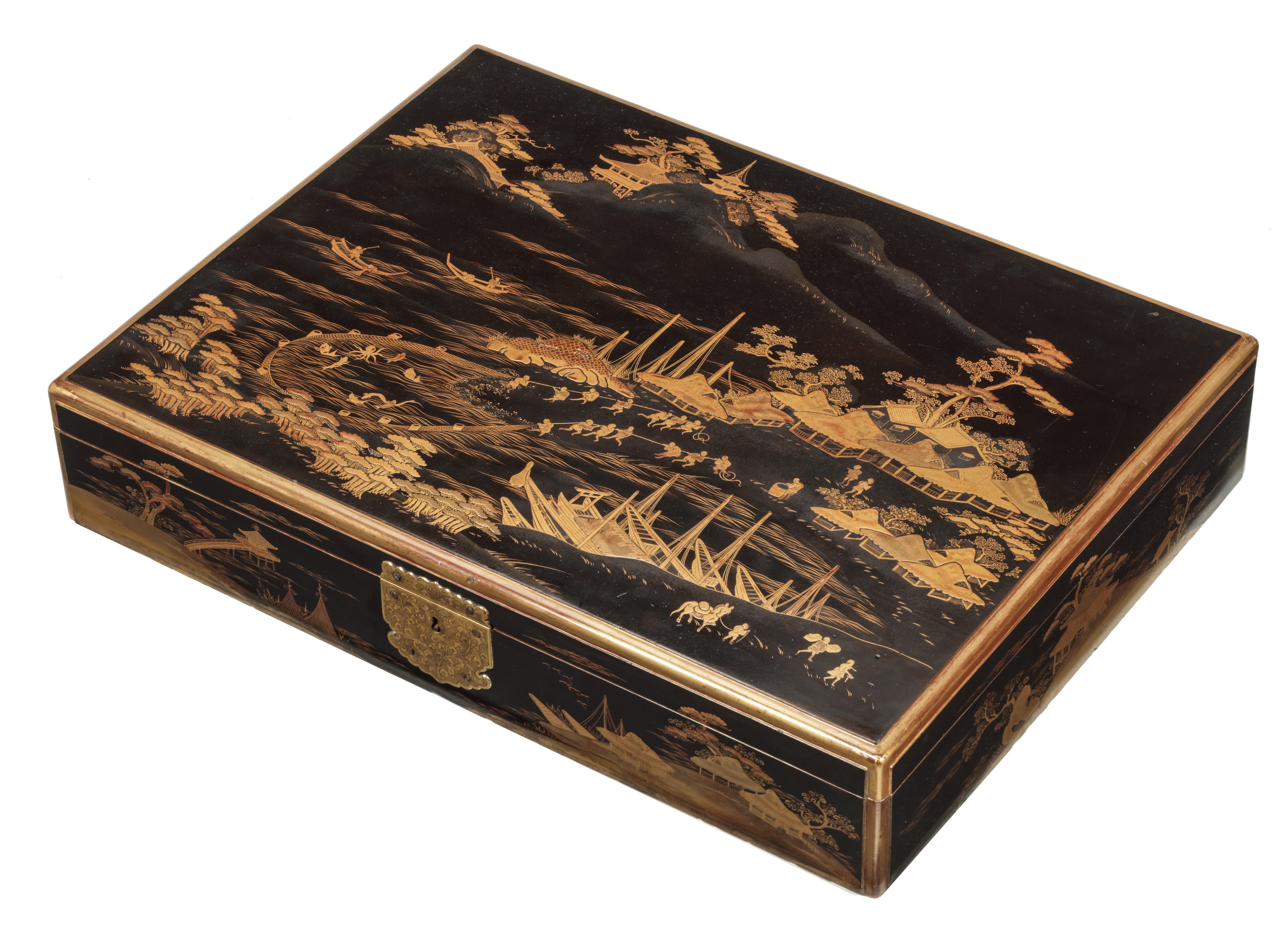 Kyoto, circa 1680

The writing box has bevelled edges and a kabusebuta (overhanging lid), and is completely covered in black lacquer in maki-e and decorated in gold, silver and red hiramaki-e and takamaki-e of superb quality. The lid is decorated