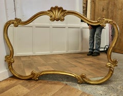 A Superb Large French Gilt Scallop Shaped Overmantel