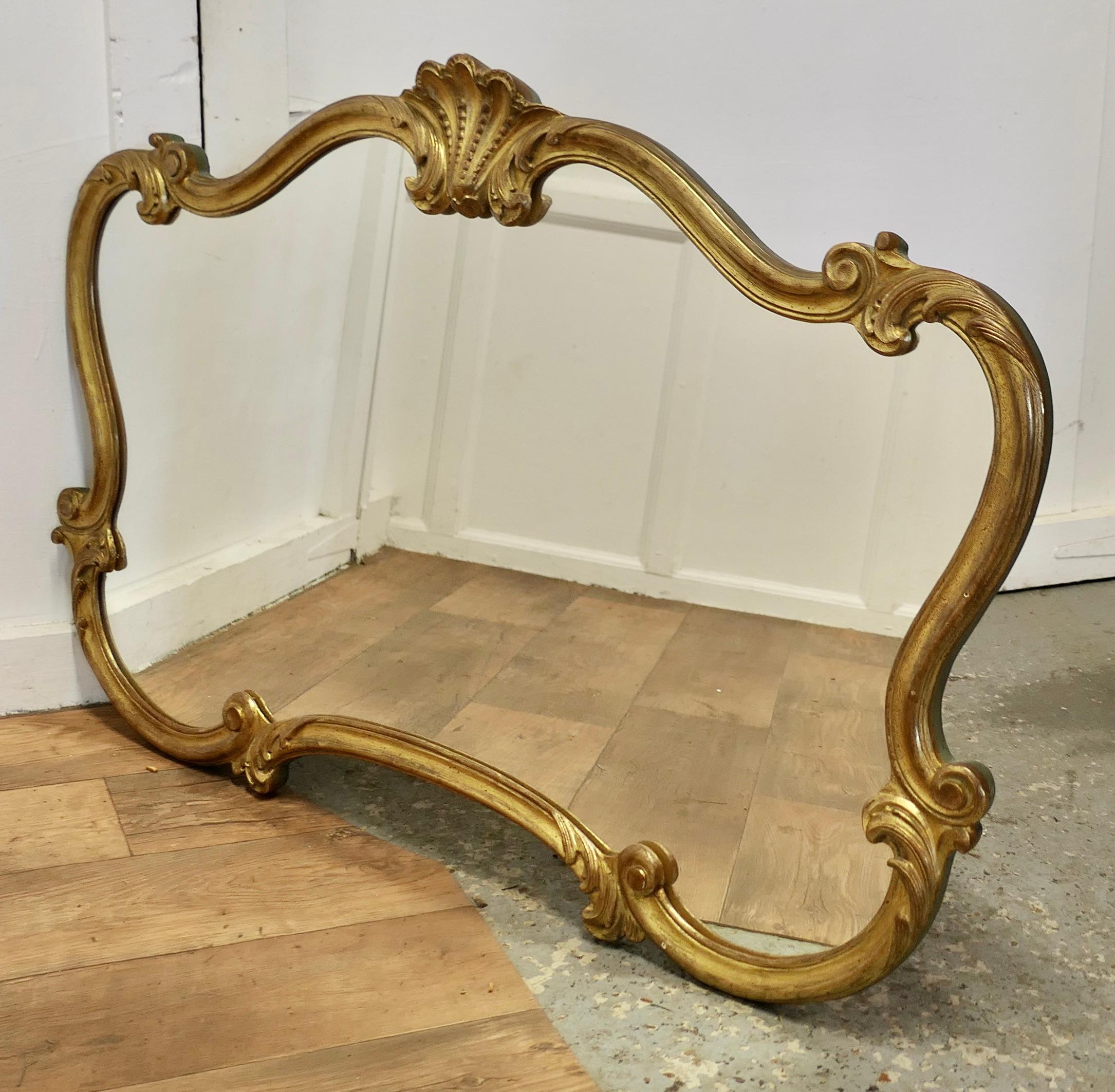 French Provincial A Superb Large French Gilt Scallop Shaped Overmantel    