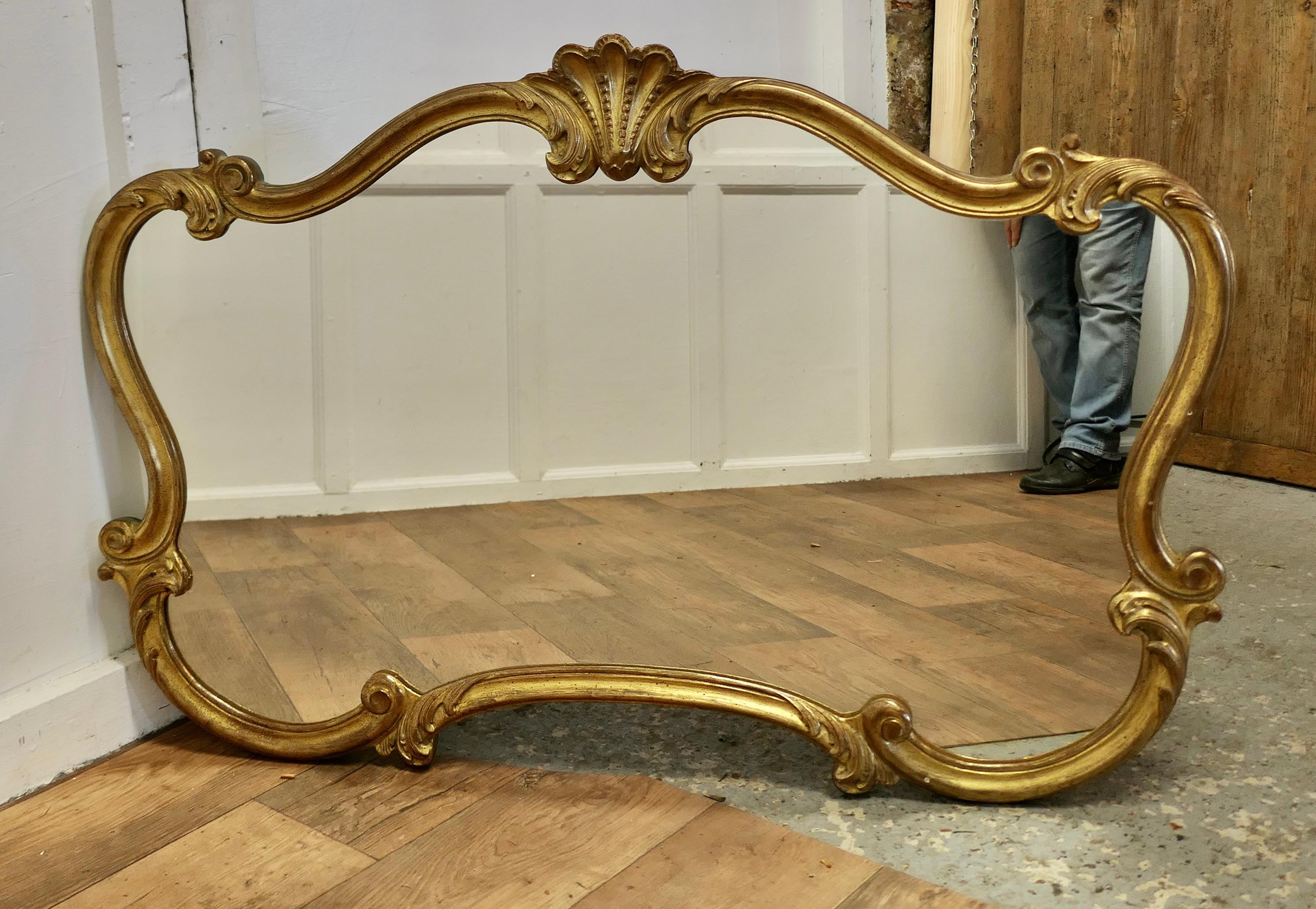 A Superb Large French Gilt Scallop Shaped Overmantel     1