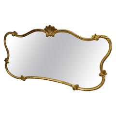 A Superb Large French Gilt Scallop Shaped Overmantel