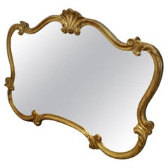 A Superb Large French Gilt Scallop Shaped Overmantel