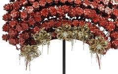 A superb Minangkabau red-enamelled and brass wedding crown or 'Suntiang'