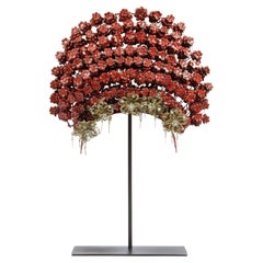 A superb Minangkabau red-enamelled and brass wedding crown or 'Suntiang'