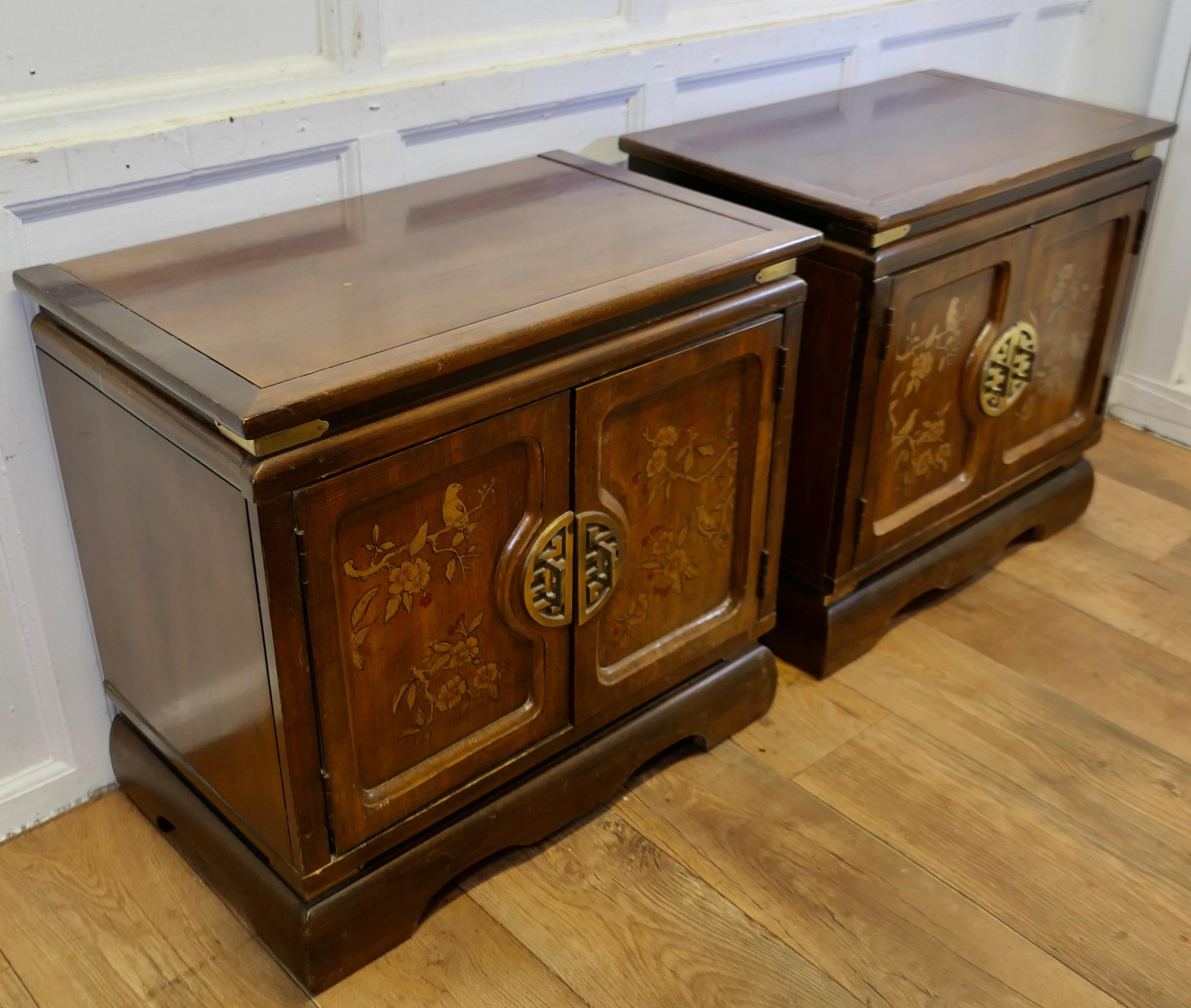 Mid-20th Century A Superb Pair of Chinoiserie Decorated Side Cabinets.    