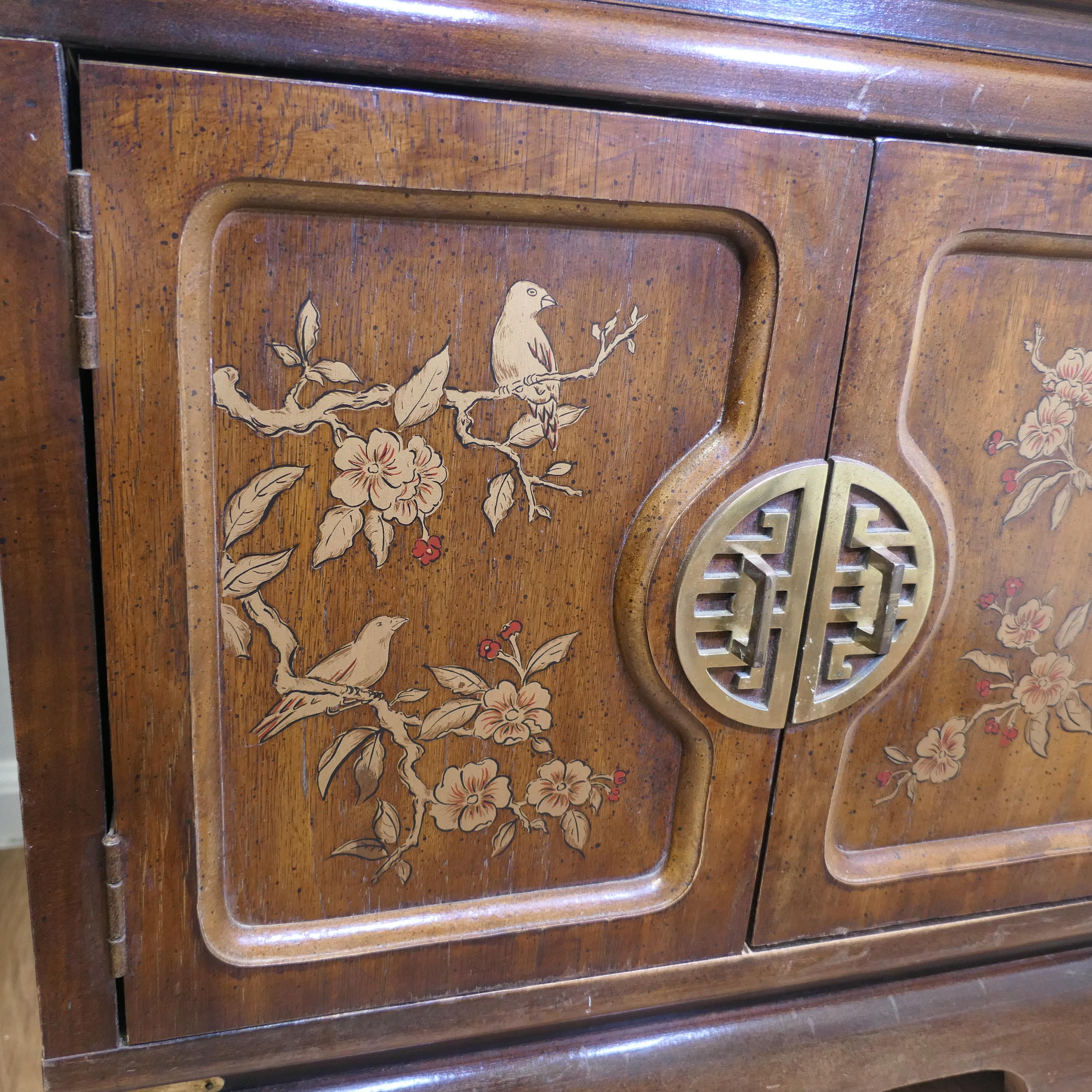 A Superb Pair of Chinoiserie Decorated Side Cabinets.     2