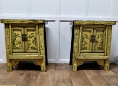 A Superb Pair of Cream Lacquered Chinoiserie Decorated Cabinets.
