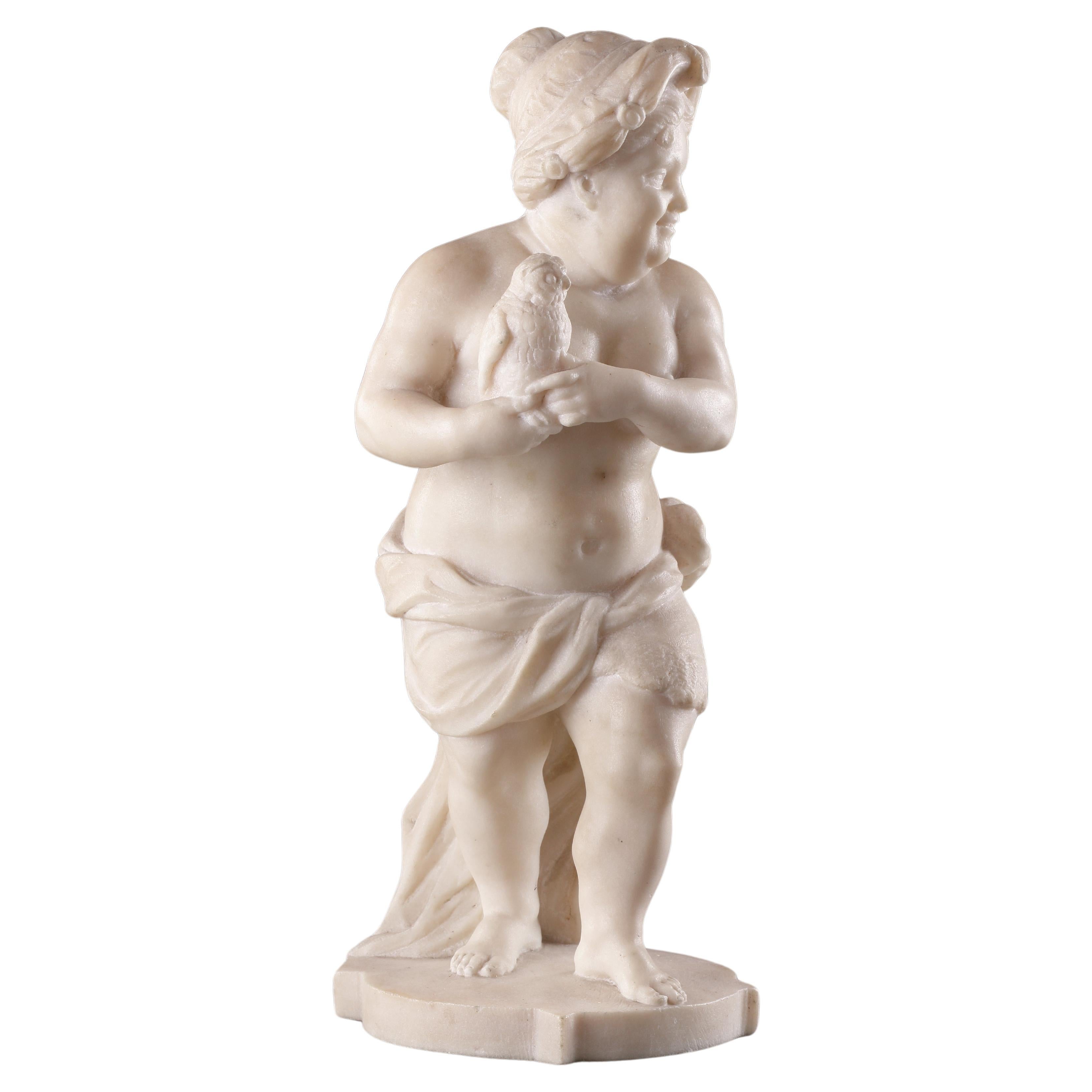A Superb Pair of Neapolitan Carved Figures of Dwarves 
Attributed to Francesco Celebrano (1729 - 1814) 
Marble 
Naples, Italy 
18th Century 

SIZE: Male: 36cm high - 14¼ ins high 
Female: 36cm high - 14¼ ins high 

PROVENANCE: 
Ex Private collection