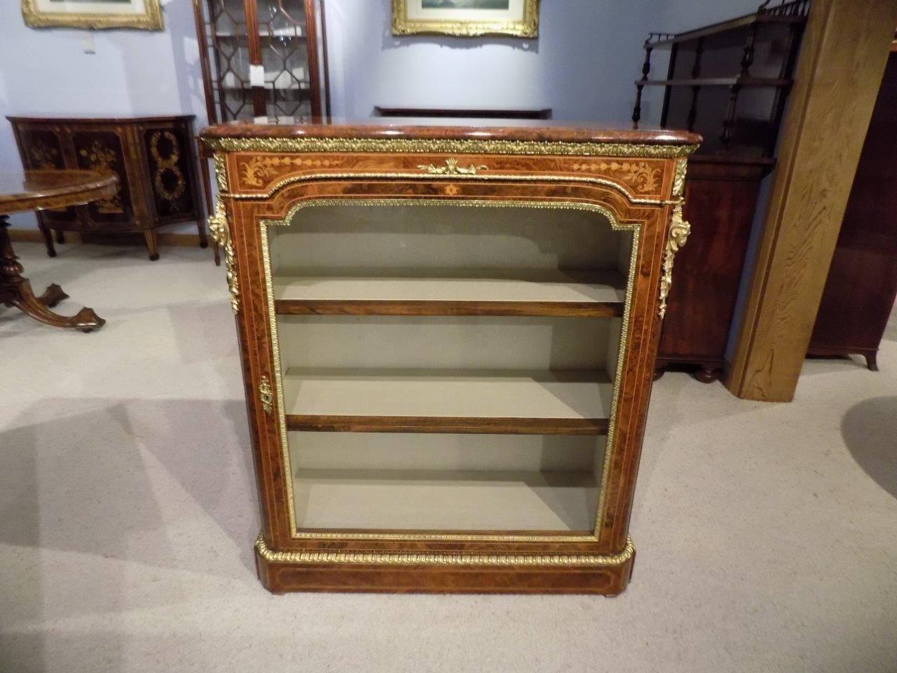 A superb pair of Victorian period burr walnut, kingwood and marquetry inlaid pier cabinets by Wilkinson & Sons, London. Each top is veneered in the finest burr walnut with kingwood and tulipwood banding above a fine marquetry inlaid frieze and