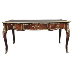 Superbe table de bureau française du 19ème siècle en bois de violette et ornementation de bronze doré