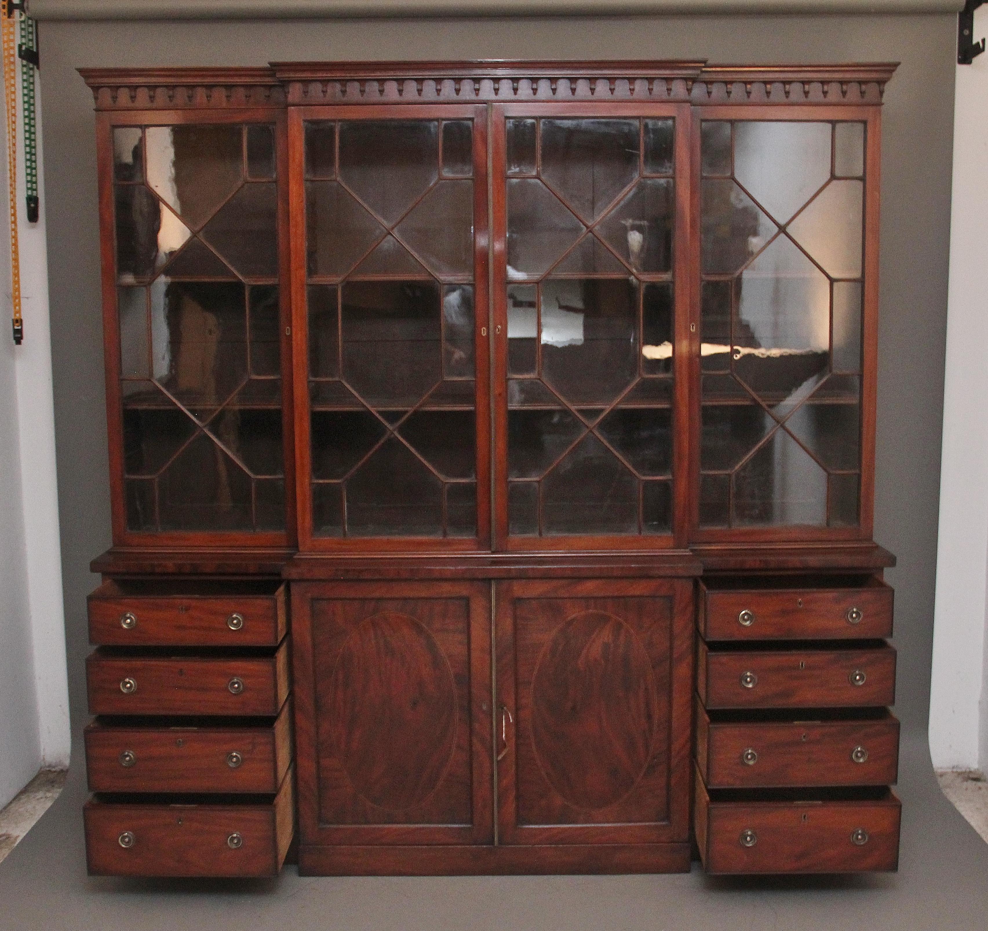British A superb quality early 19th Century mahogany breakfront bookcase For Sale