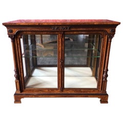 A superb quality Victorian Period burr walnut two door display cabinet