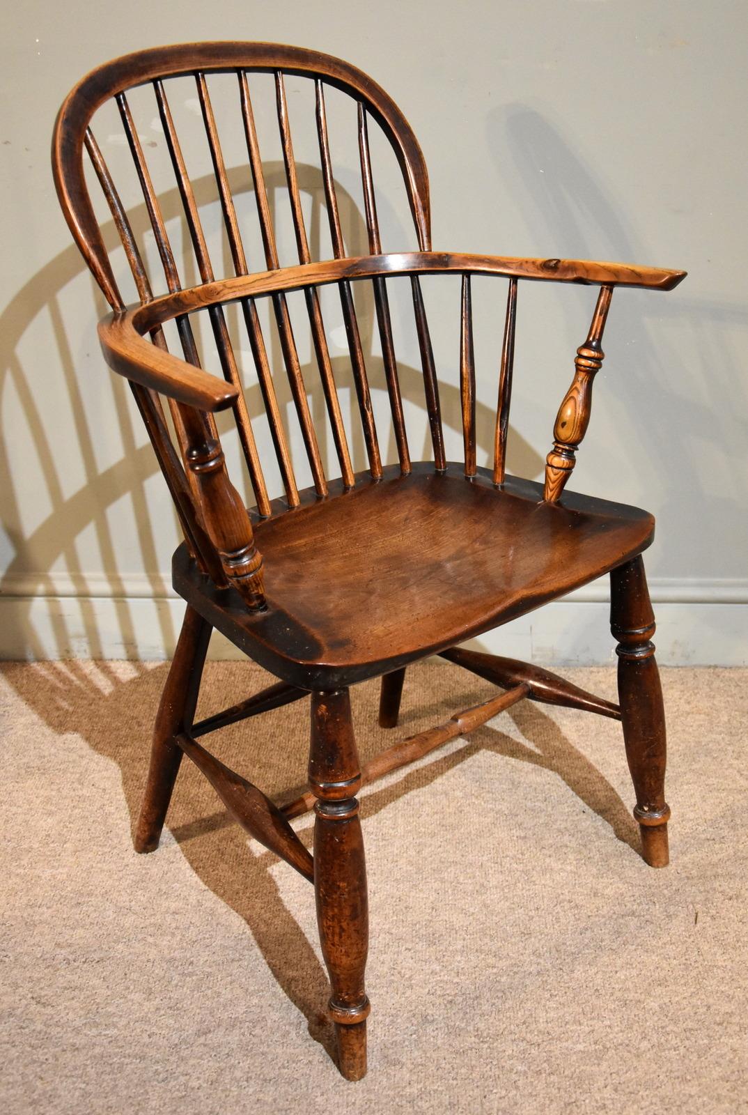 English A Superb Set of Four Ash and Elm Windsor Chairs