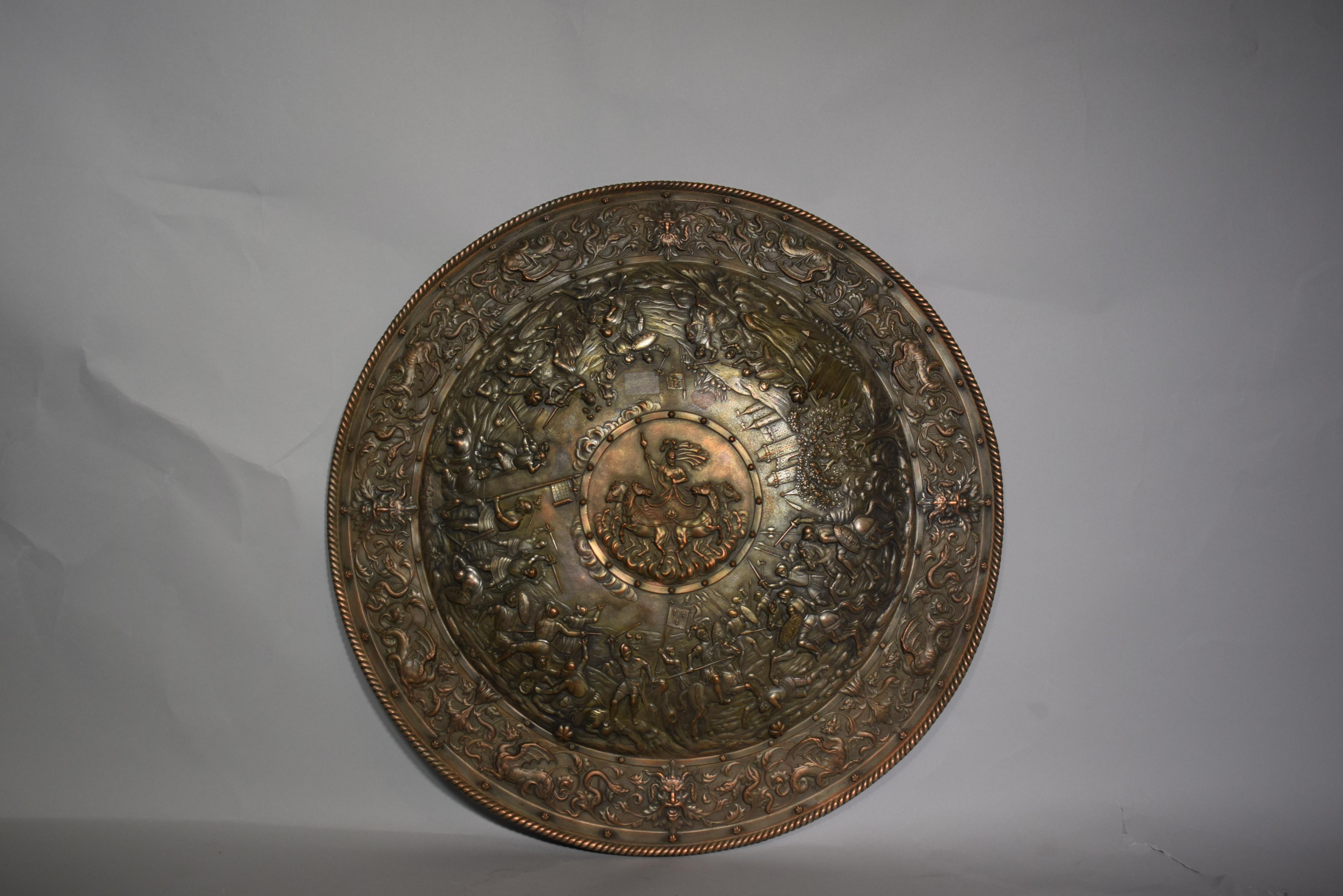A superb silverplated circular shield depicting battle scene. Exquisite detail. England circa 1880.
Dimensions: Height 2 1/2