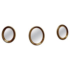 A Superb Trio of French Oval Giltwood  Mirrors