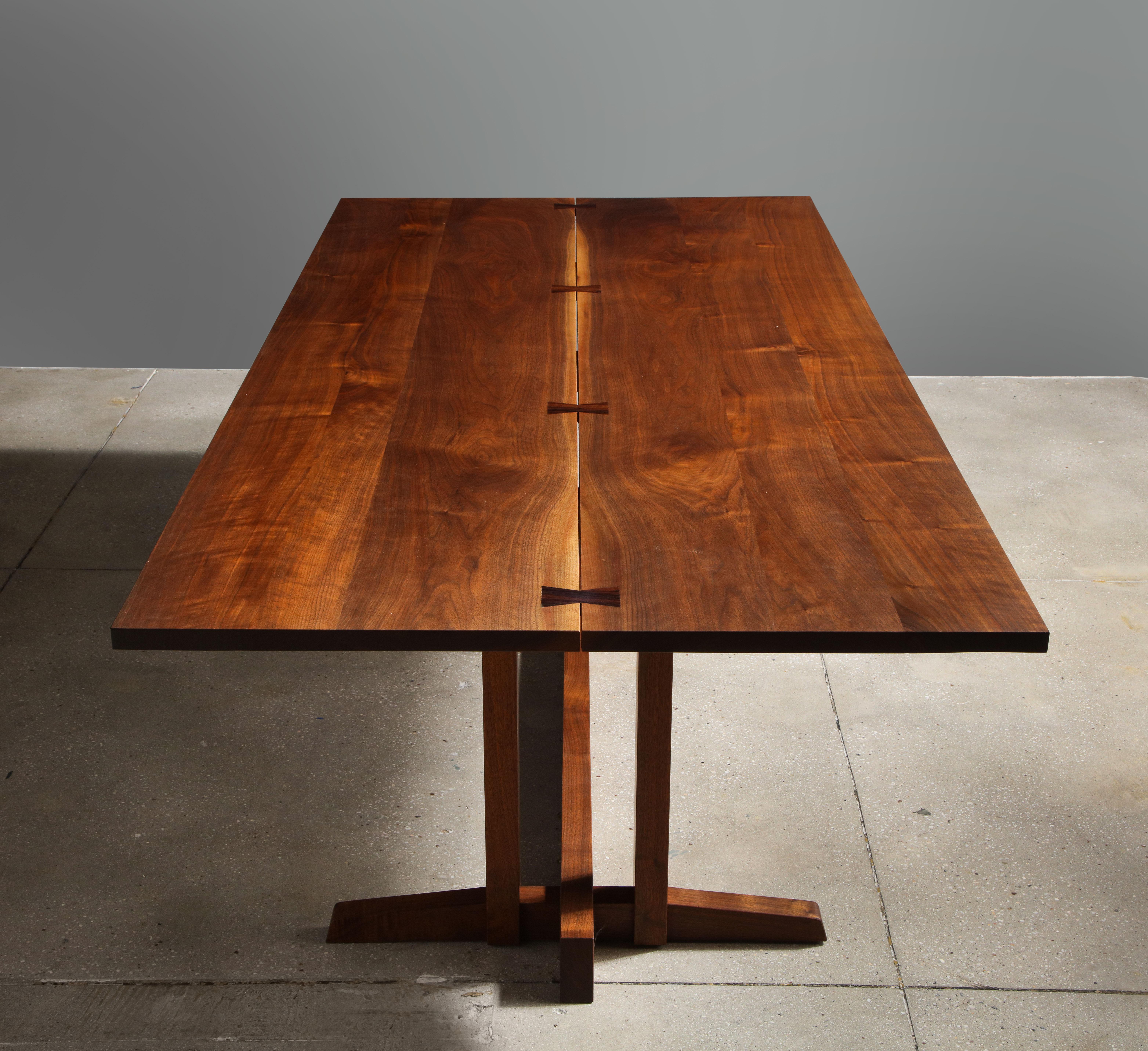 George Nakashima’s superb Frenchman’s Cove dining table walnut with four large rosewood butterflies.

Recently restored by Nakashima Studios.

Provenance includes all original purchase receipts and letter of authenticity from Nakashima