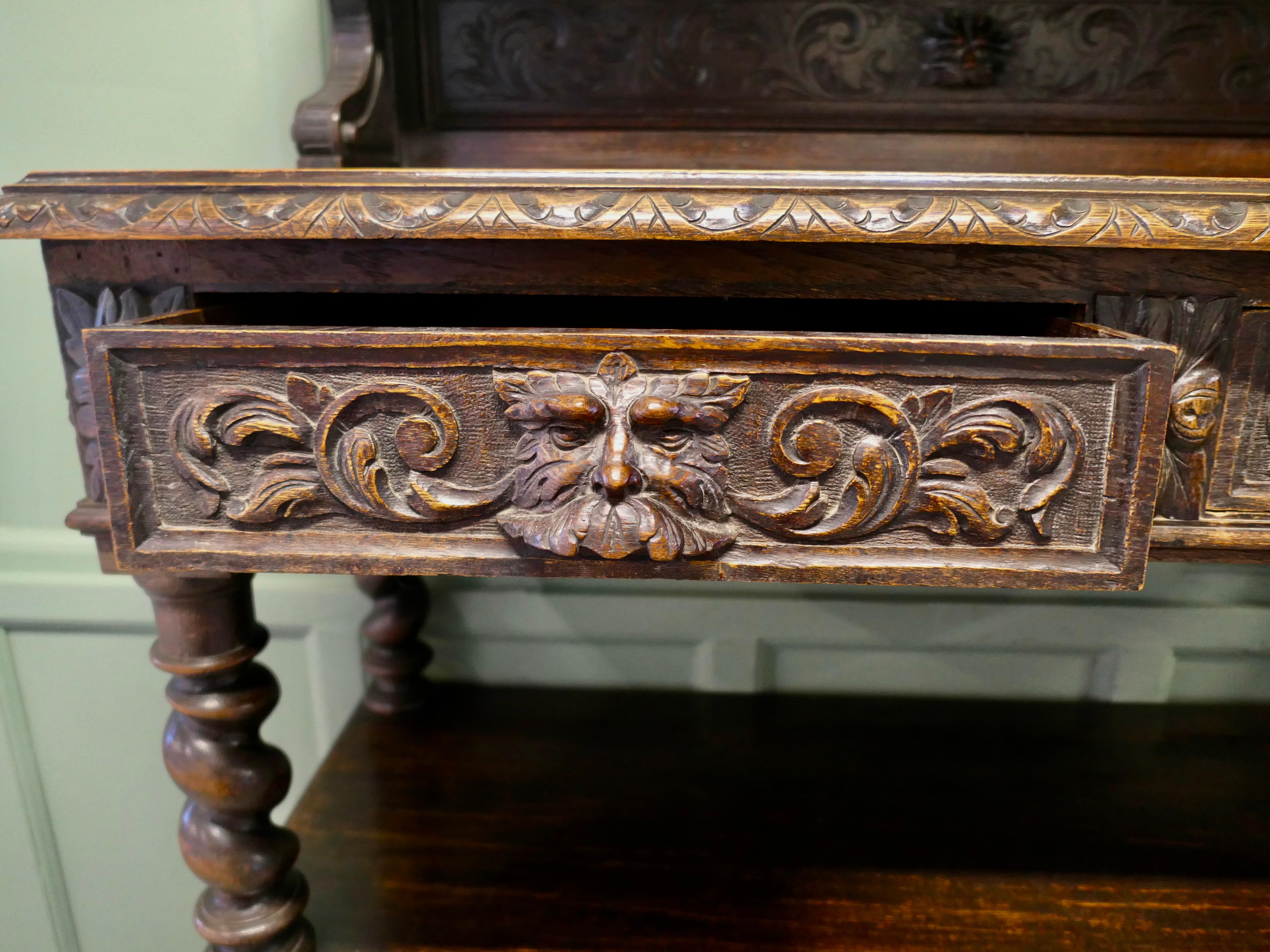 19th Century A Superbly Carved Green Man Oak Side Board or Buffet For Sale