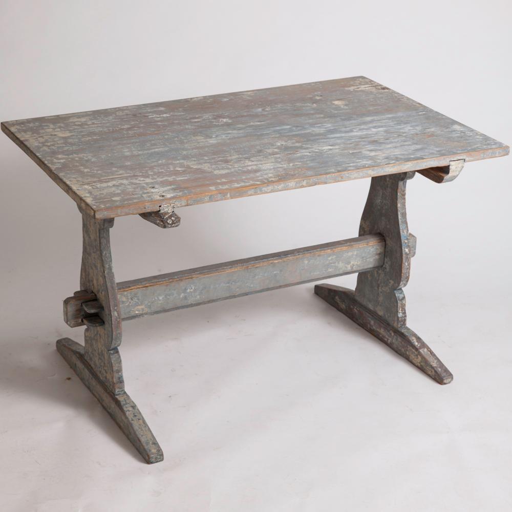 This Swedish trestle table has been dry scraped to a wonderful original blue surface. Perfect for eating, or with its removable large drawer, makes a great desk or worktable. The original pegs on both sides make it stable.
Ref. 7-7555
$4,400
49”
