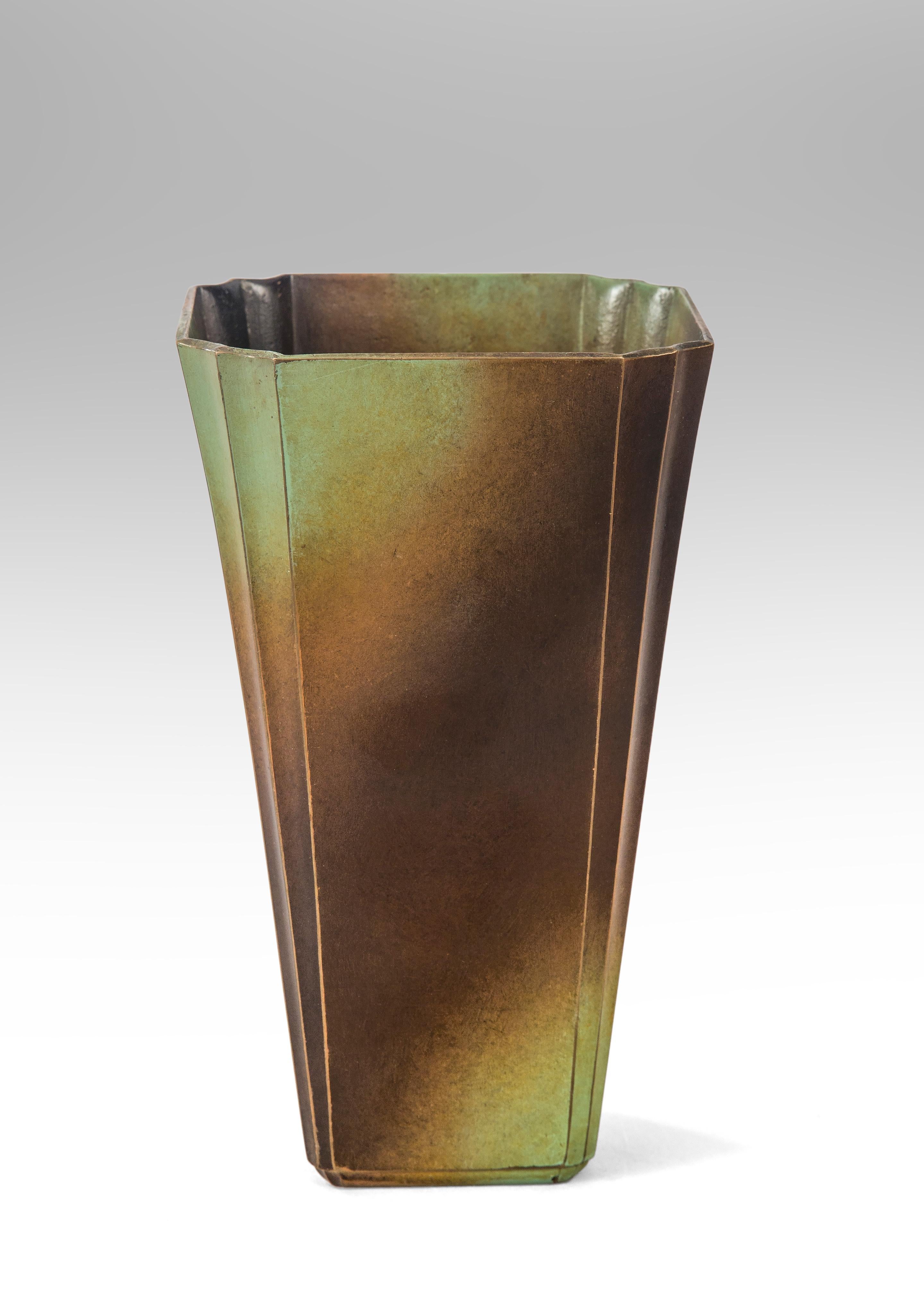 Ystad Metall 
A Swedish Art Deco patinated bronze vase
Early 20th Century
The square tapering vase with double fluted corners enhanced with a beautiful patination of green and brown. A rare and very good, heavy cast vase by this maker.
Marked: