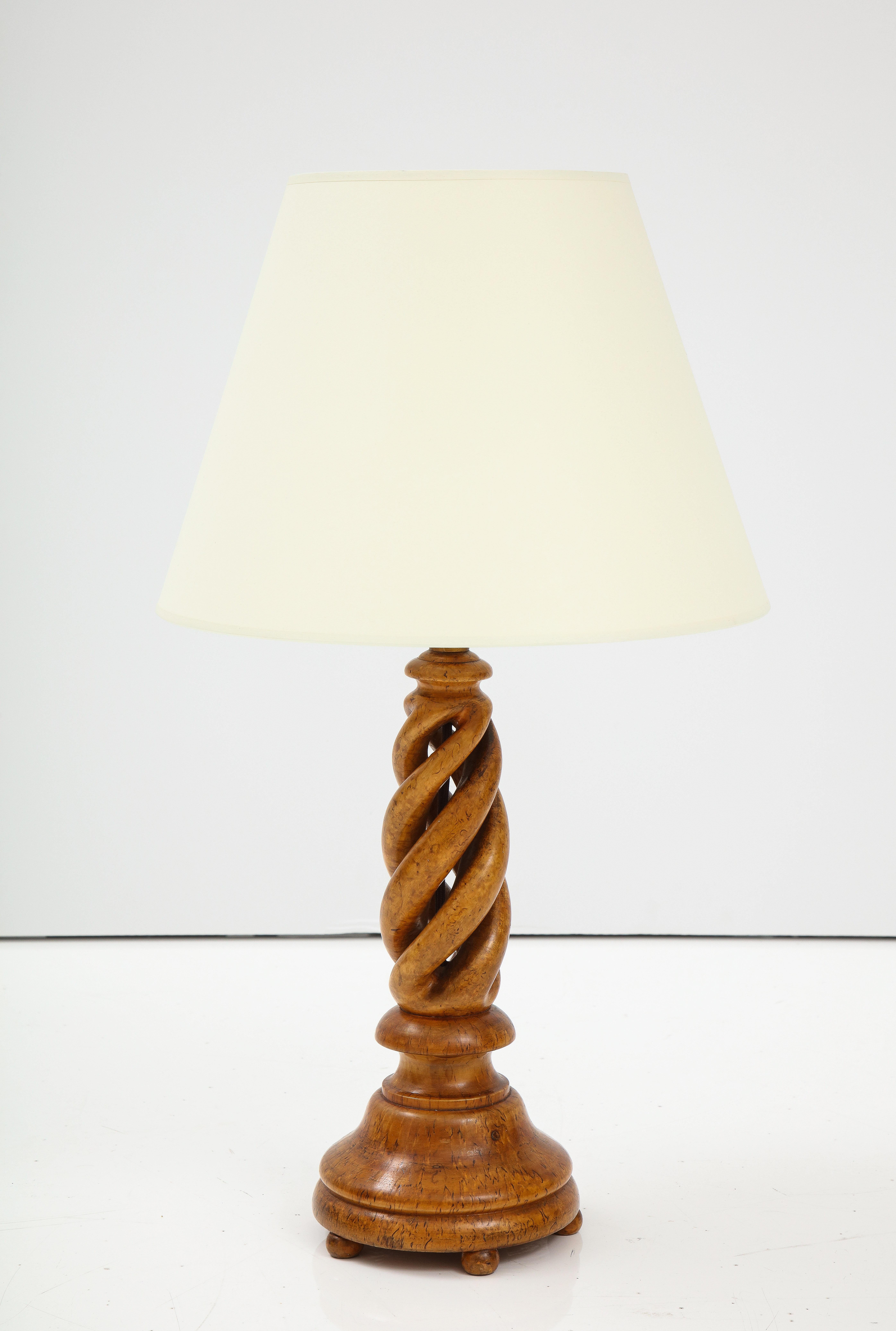 A Swedish birch root barley twist turned table lamp, Circa 1960s, Great color and form. Rep-wired for US. 1 60watt max. New off white paper shade.




