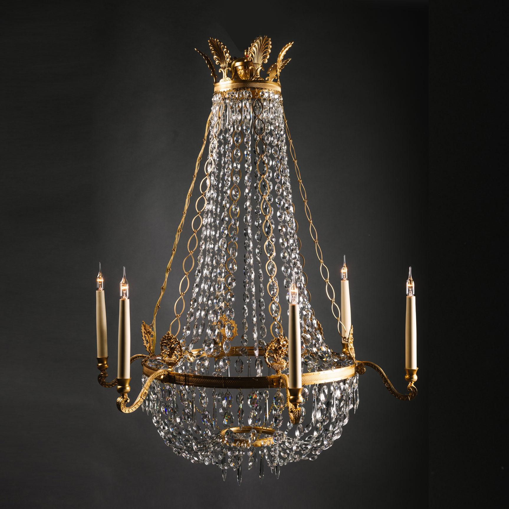A fine Swedish Empire style gilt-bronze and cut-crystal tent and basket chandelier.

Swedish, Circa 1825.