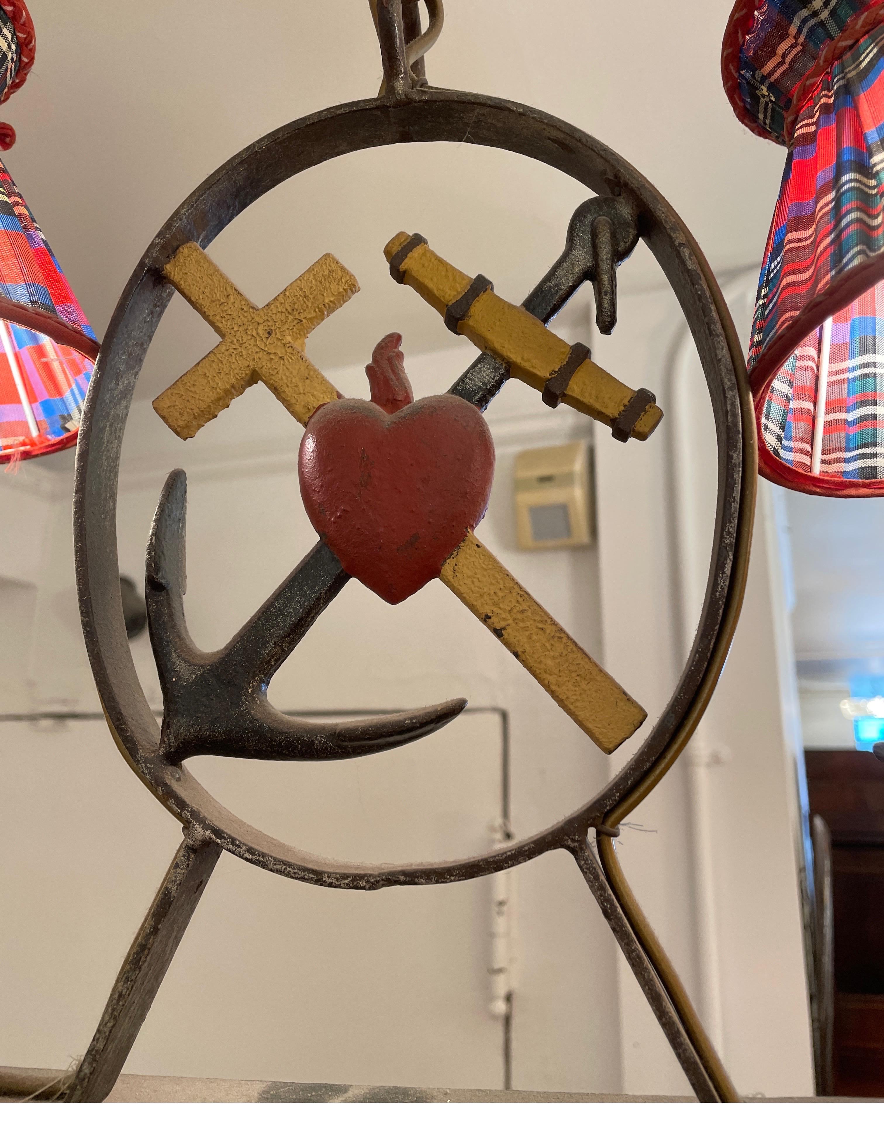The Swedish shipbuilders' longtime tradition of hanging scale-sized models of finished ships in churches for protection of ship and crew has inspired such folk art sculptures. We have here a lovely example of the good ship 