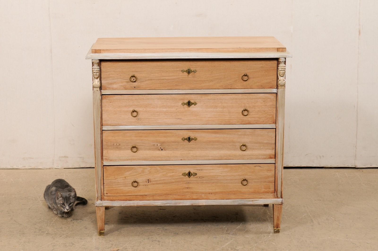 A Swedish gustavian bleached-wood chest of drawers, circa 1820-1840. This antique chest from Sweden, in typical Gustavian style, features a simple, clean design with a slightly overhanging lip about the top edge, with case below housing four