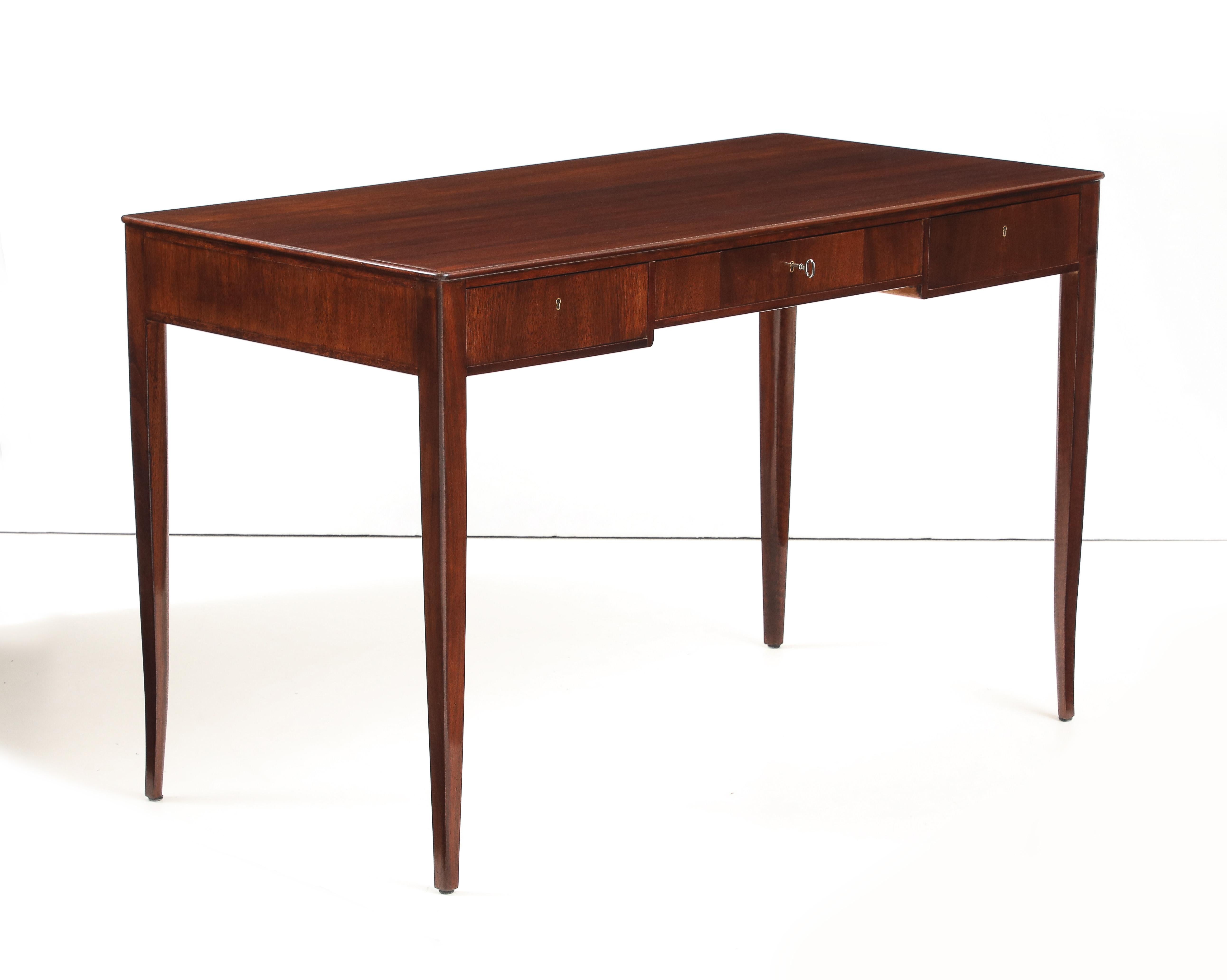 Scandinavian Modern A Swedish mahogany writing desk designed by Carl Malmsten Circa 1966 For Sale