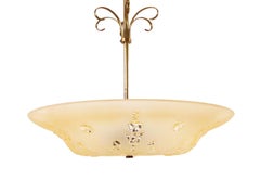 A Swedish Modern Glass and Brass Pendant