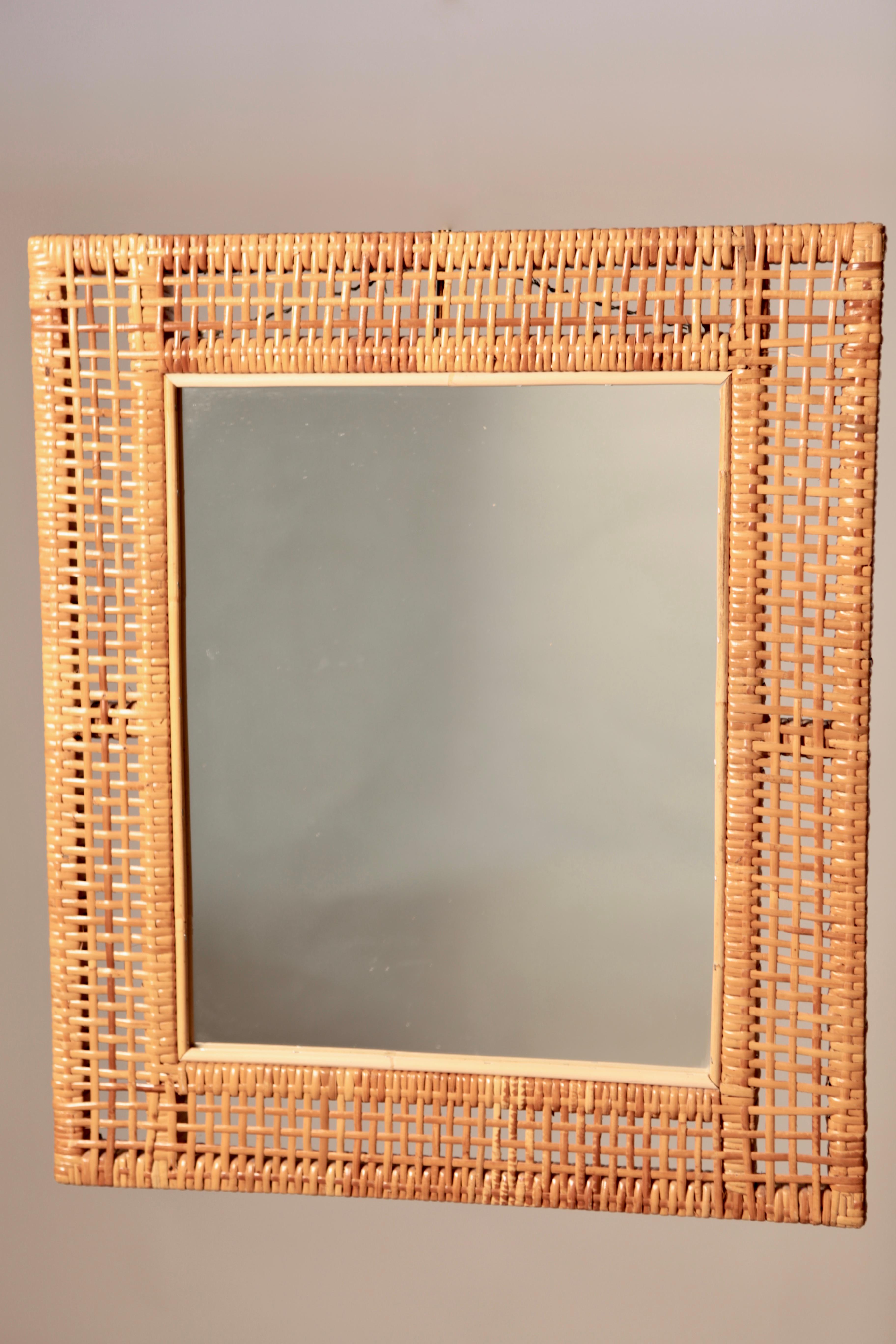 A rare Scandinavian Modern mirror, manufactured in rattan and bamboo, in very nice original vintage condition, Sweden, 1940s.