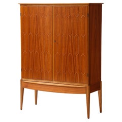 Meuble de rangement moderniste suédois en teck, vers 1940-50