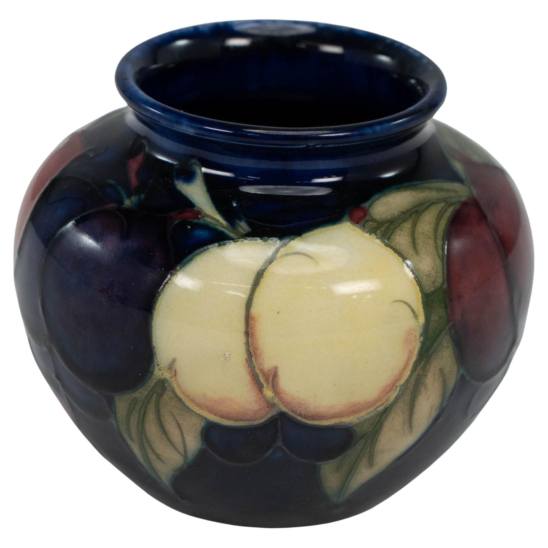 A sweet little William Moorcroft Leaf and Berry vase