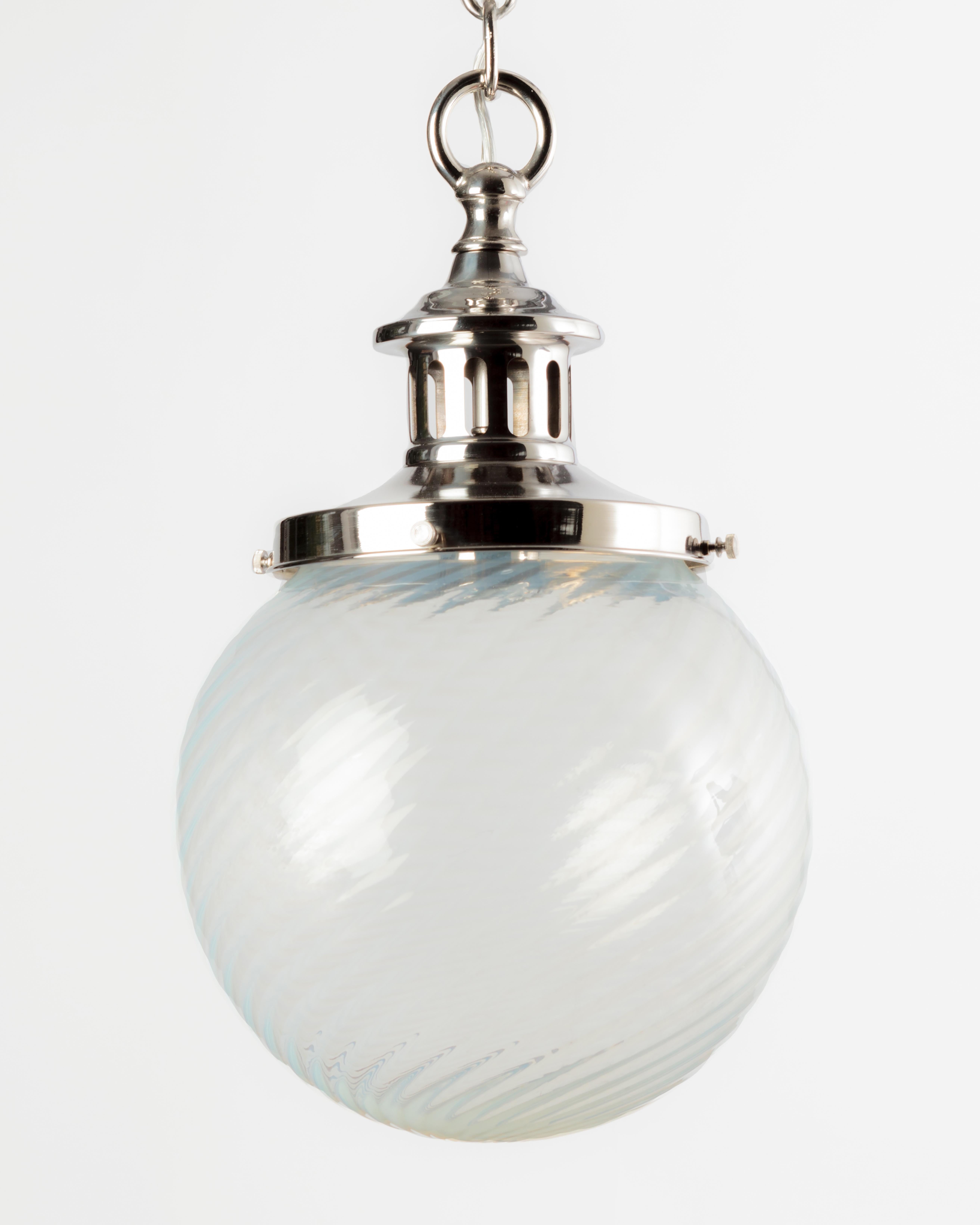 AHL3759

Circa 1900
An antique pendant with a swirled opalescent glass shade on nickel fittings custom made in the Remains Lighting Co. workshop.

Dimensions:
Current height: 58