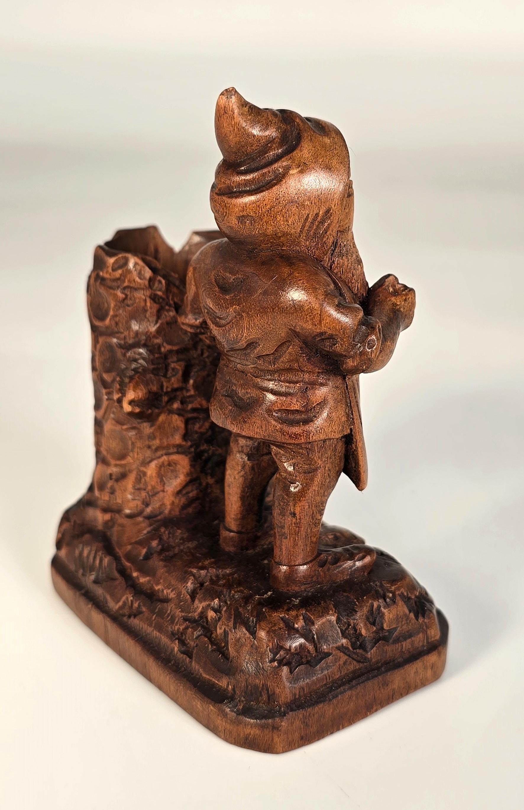 A Swiss Black Forest gnome matchstick holder/striker made in 1916 en vente 7