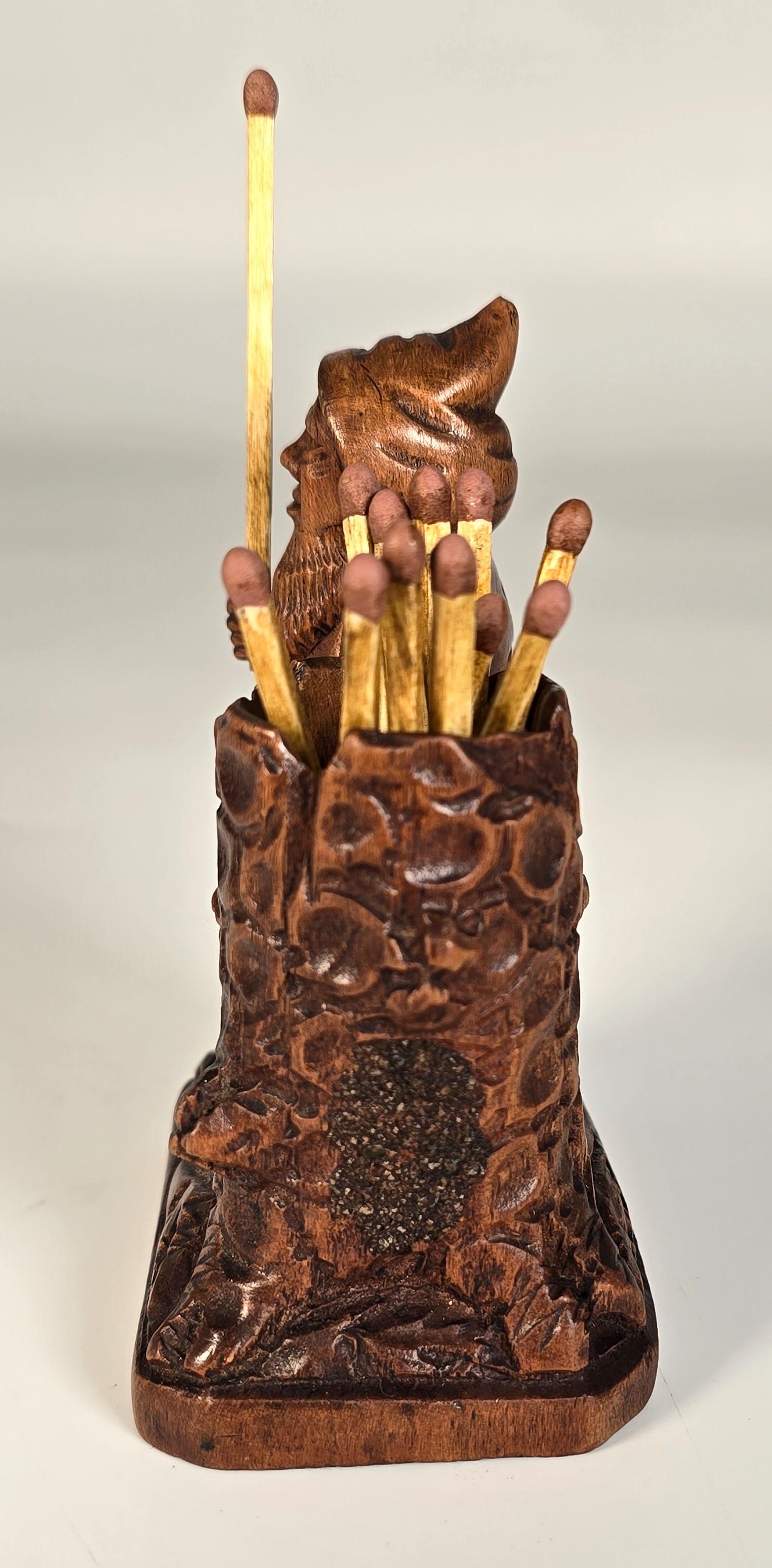 Forêt-Noire A Swiss Black Forest gnome matchstick holder/striker made in 1916 en vente