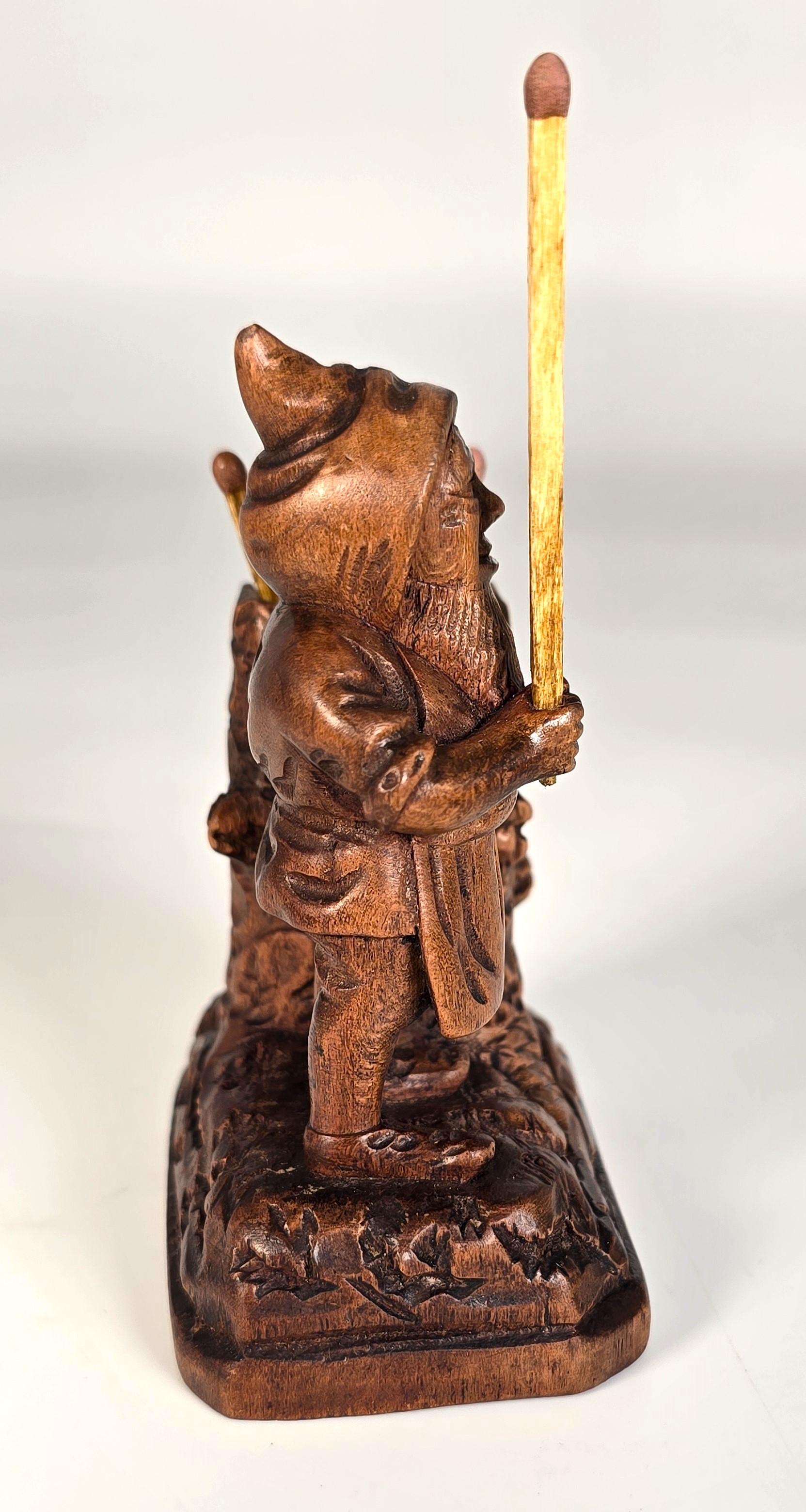 20ième siècle A Swiss Black Forest gnome matchstick holder/striker made in 1916 en vente