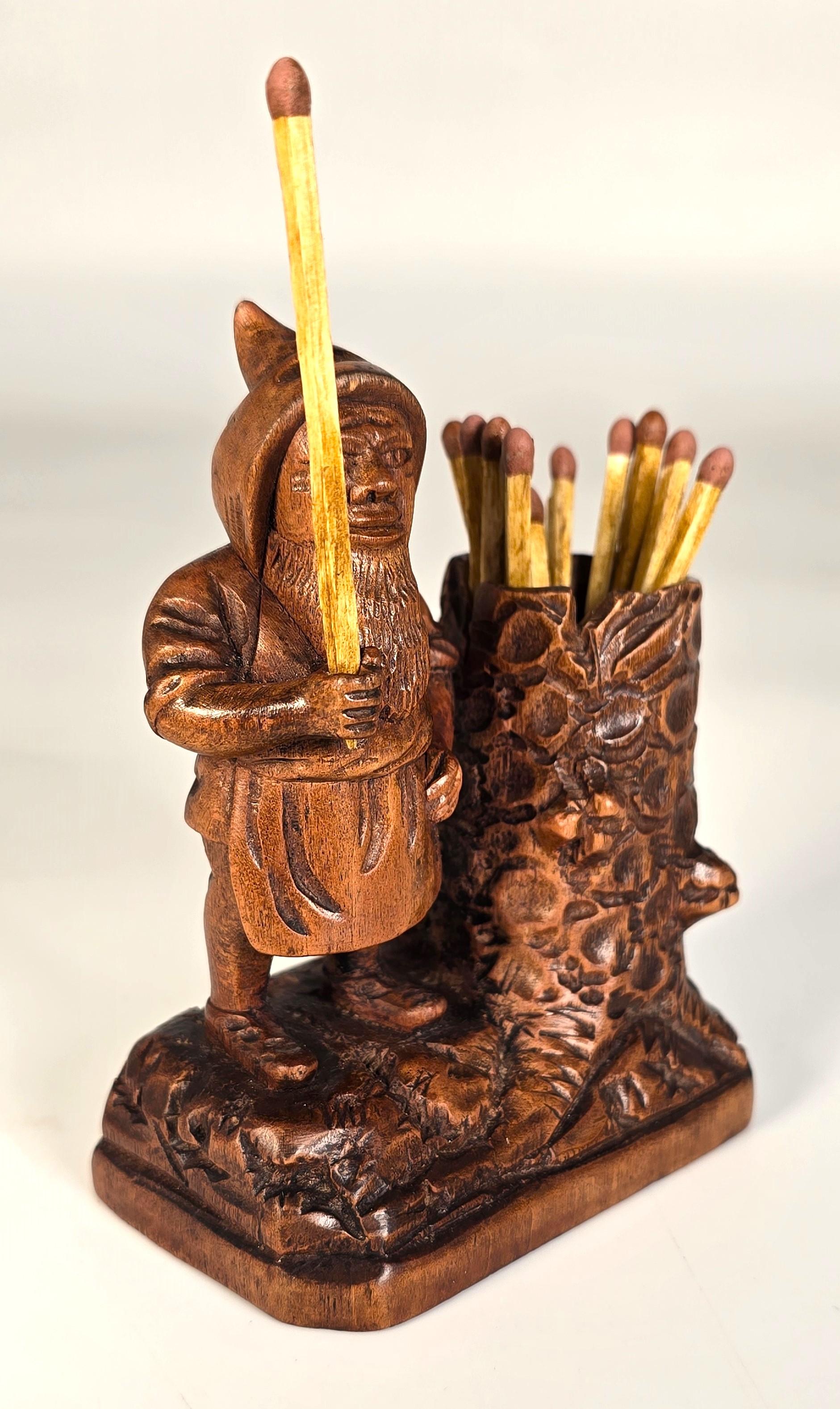 Bois A Swiss Black Forest gnome matchstick holder/striker made in 1916 en vente