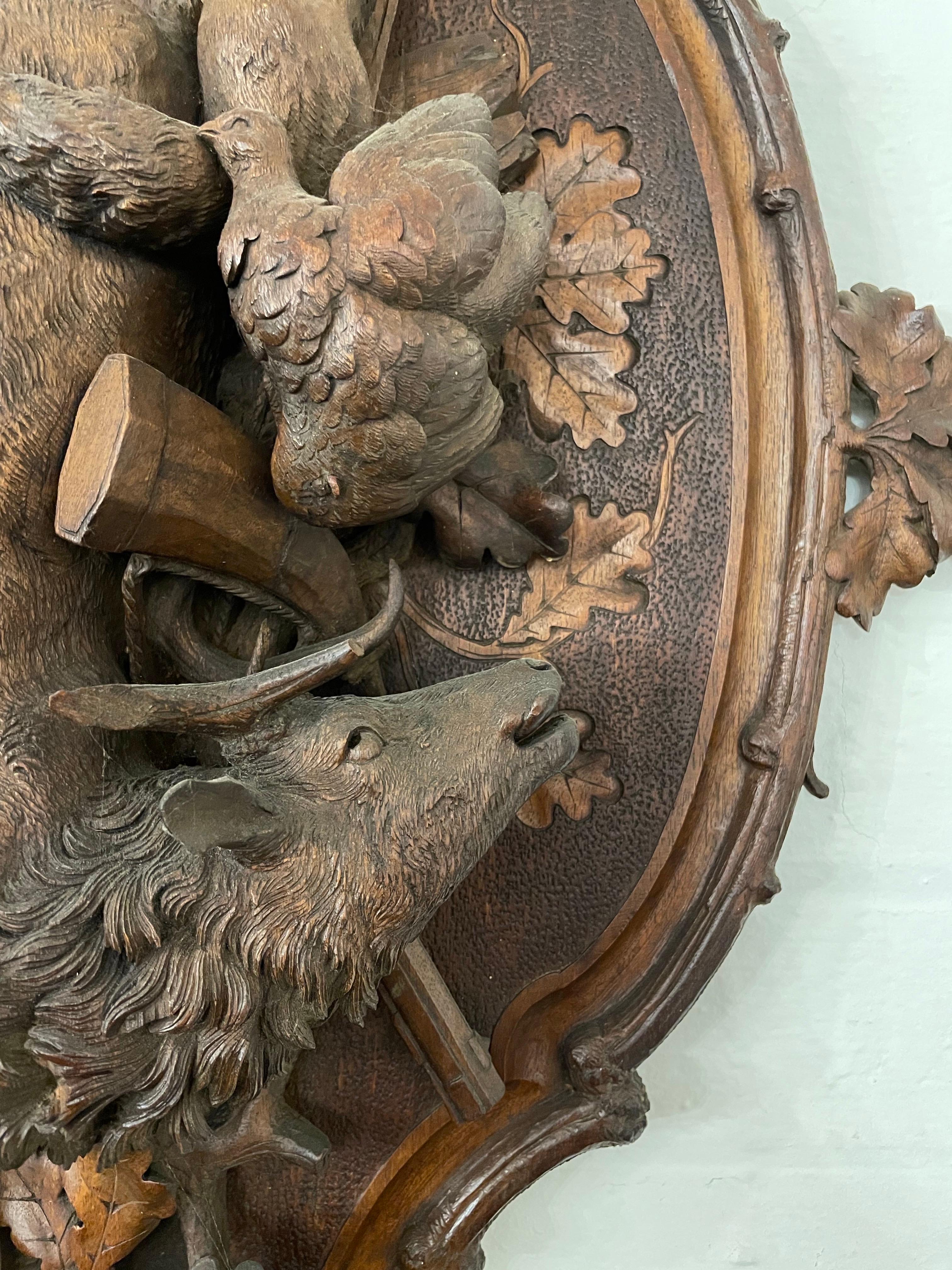 Wood A Swiss Carved Black Forest Hunting Wall Plaque, Early 20th Century For Sale