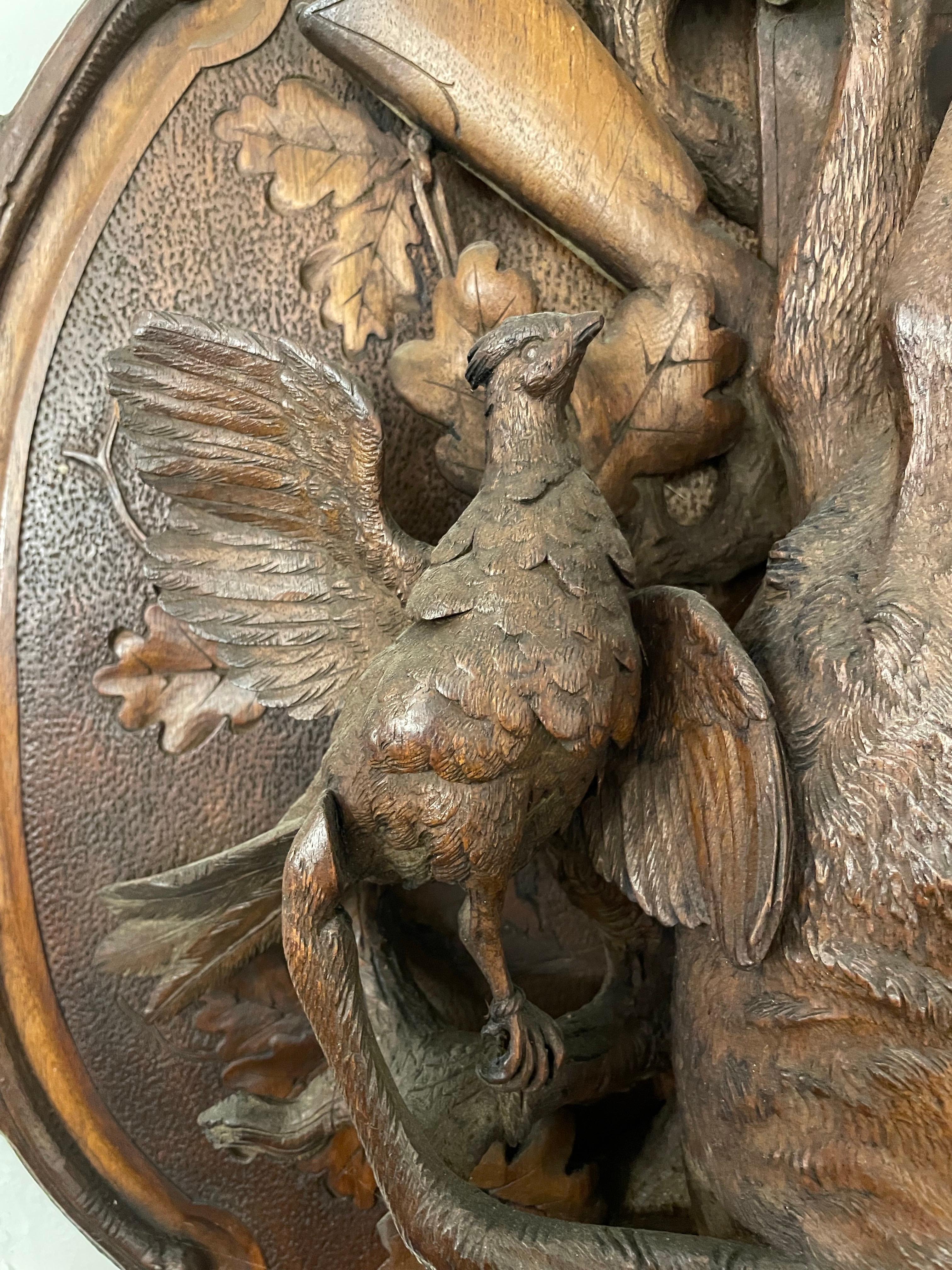 A Swiss Carved Black Forest Hunting Wall Plaque, Early 20th Century For Sale 2