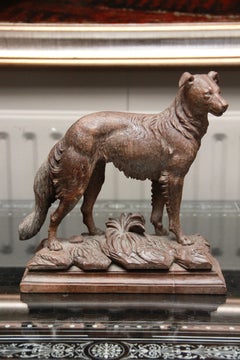 A Swiss Carved Black Forest Linden Wood model of an alert Borzoi Circa 1900