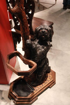 A Swiss Carved Black Forest Umbrella Stand, Linden Wood, Circa 1890.