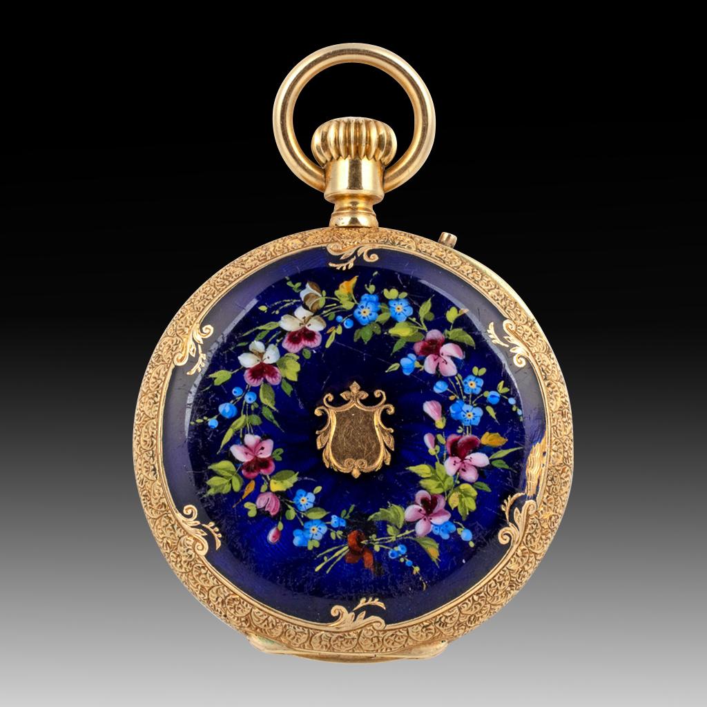 A Swiss Open-Faced 18k Gold and Enamel Pocket Watch, By Martin & Marchinville Circa. 1880

This is an exquisite rare antique enamelled watch by Swiss watchmaker Martin & Marchinville. The circular gold gilt dial is adorned with a floral motif, black