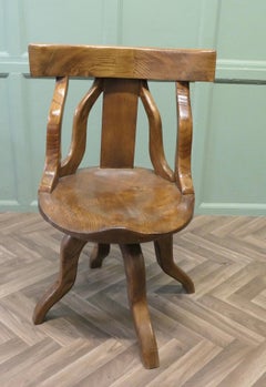 A Swivelling Elm Office Chair or Desk Chair