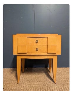 A sycamore night stand in the style of André Arbus